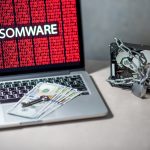 Ransomware on computer screen and encrypted data
