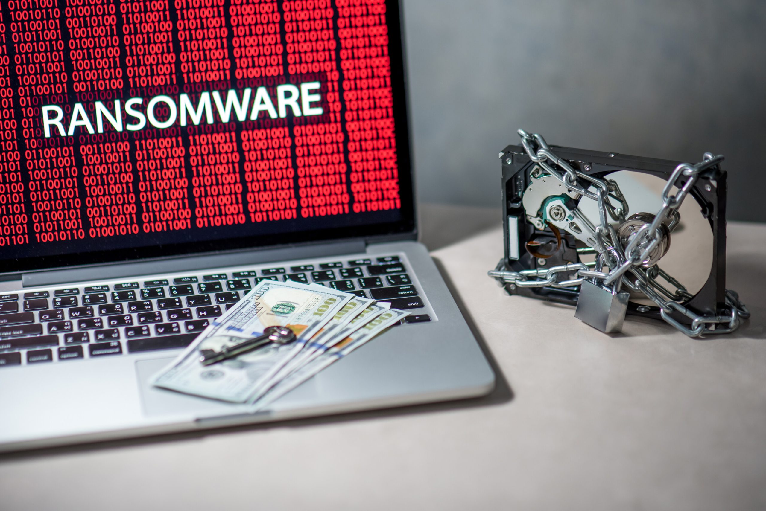 Ransomware on computer screen and encrypted data